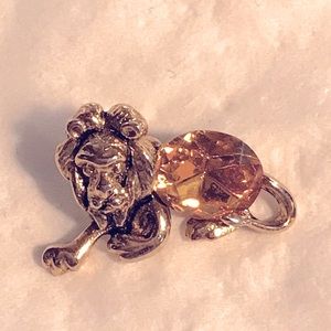 Guardian Angel Lion with Topaz stone for the month of November’s birthstone.